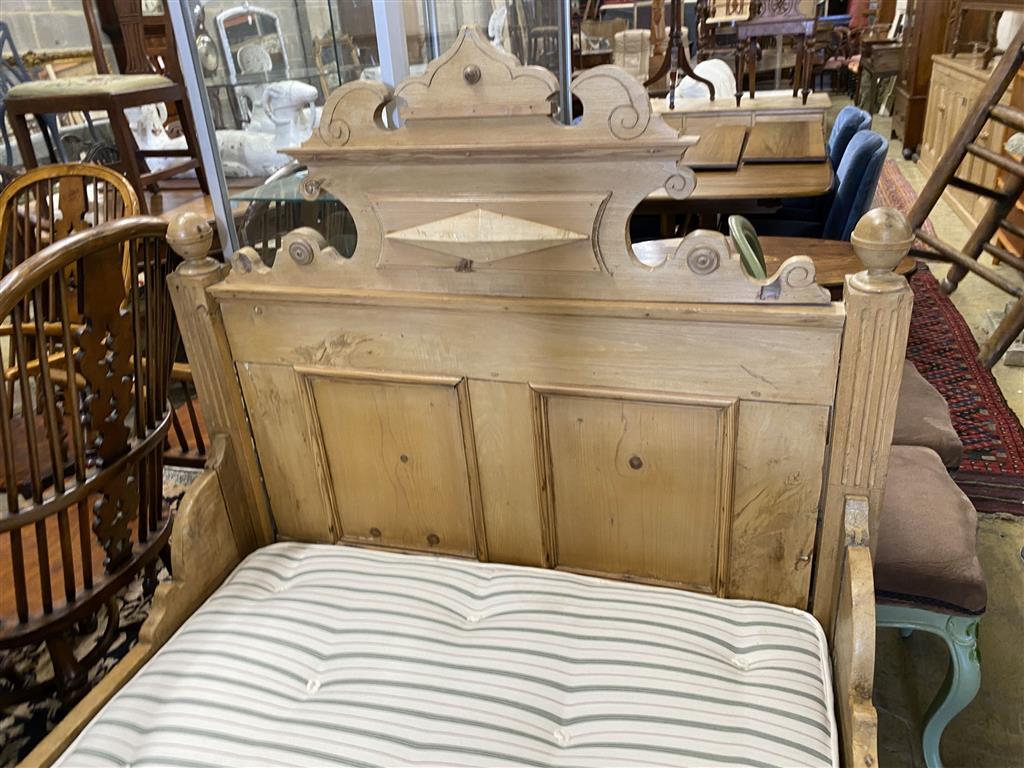 A 19th century Continental pine single bedstead with new mattress, width 115cm, length 190cm